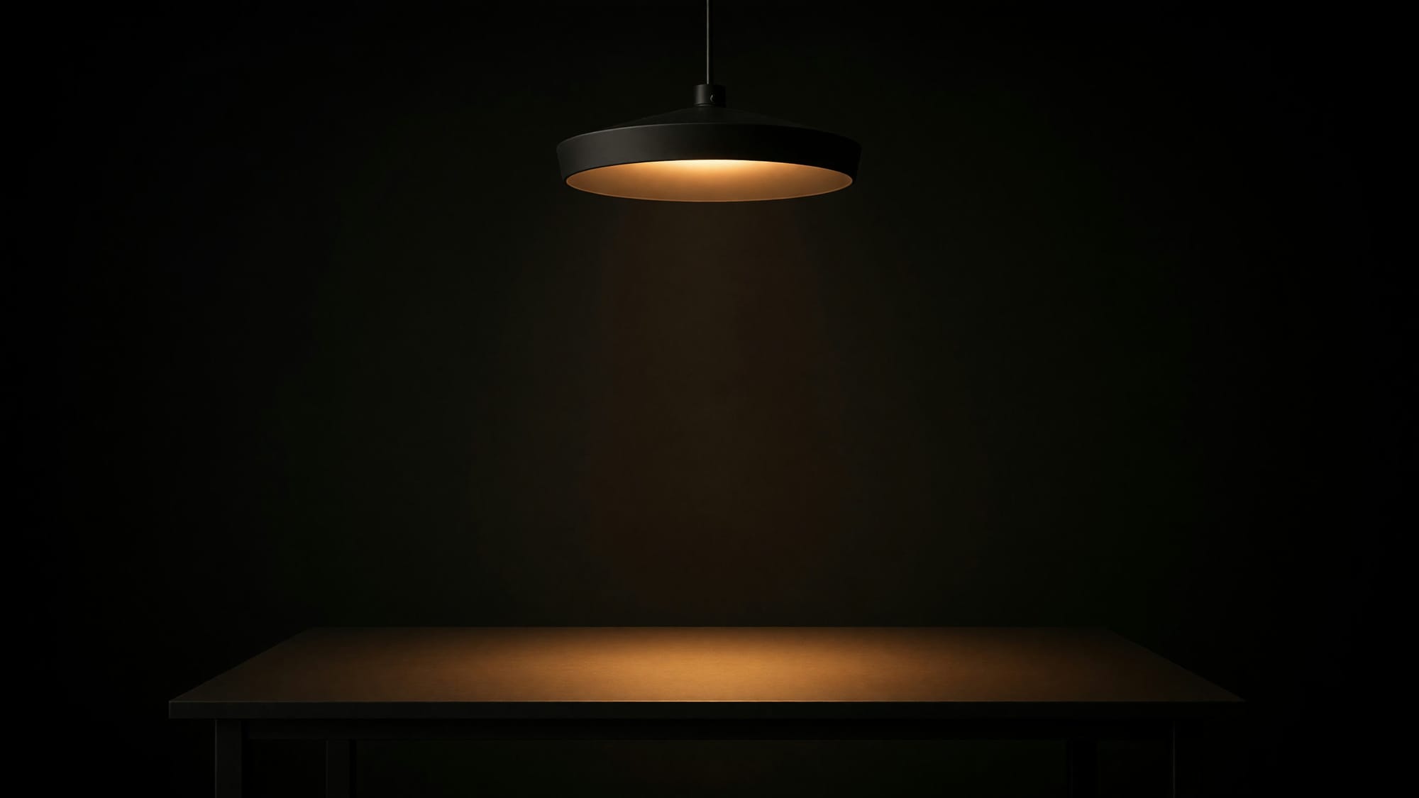 Dimpsy Halo hanging lit above a dining table